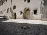 Berlin city architecture with cobblestone road