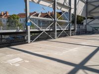 a parking garage has been placed open to let people in and around it for the summer