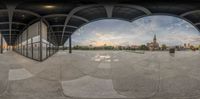 an eye view of a city through three fish eye lenses in a circular shape