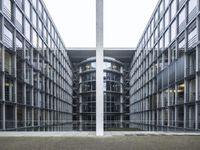 the large building is empty and has a lot of windows on it's sides