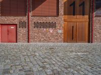 Berlin City: Cobblestone Road and Brick Walls