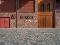 Berlin City: Cobblestone Road and Brick Walls