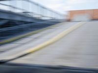 the train station is moving through motion blurry as if it was a train at the station