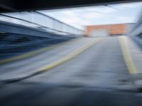 the train station is moving through motion blurry as if it was a train at the station