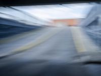 the train station is moving through motion blurry as if it was a train at the station