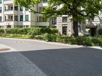 Berlin City: Daytime on an Asphalt Road Surrounded by Buildings