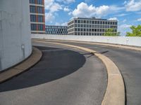 a car is driving on the highway through an underground parking garage area in a city