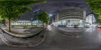 a 360 - view of the streets at night with a car parked next to them