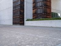 a skateboard is seen outside the front of a building with its wheels in motion