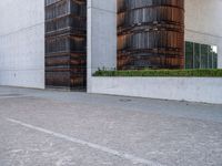 a skateboard is seen outside the front of a building with its wheels in motion