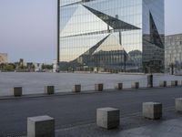 the city plaza has been constructed from glass in its design and architecture to resemble a modern building