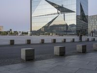 the city plaza has been constructed from glass in its design and architecture to resemble a modern building