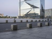 the city plaza has been constructed from glass in its design and architecture to resemble a modern building