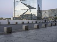 the city plaza has been constructed from glass in its design and architecture to resemble a modern building