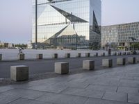 the city plaza has been constructed from glass in its design and architecture to resemble a modern building