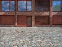 Berlin City Residential: Courtyards with Brick Walls