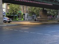 the view under the highway, on a rainy day of the city street and on the streets with buildings and bicycles