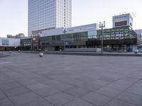 the empty space between two buildings that look like a city square for pedestrians to enjoy