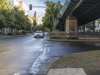 the view under the highway, on a rainy day of the city street and on the streets with buildings and bicycles