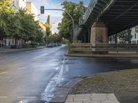 the view under the highway, on a rainy day of the city street and on the streets with buildings and bicycles