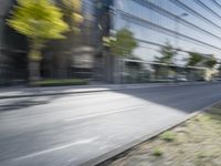 a view of a city street from a moving car lens with a blurry background