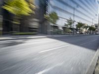 a view of a city street from a moving car lens with a blurry background