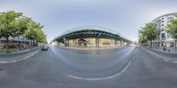 the circular panoramic view looks like an outside world view of the city street with many buildings