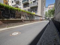 Berlin City Wall: A Cobble Stone Road