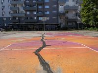 Berlin City Wall with Graffiti and Basketball Court