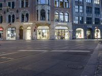 the street is empty but not as many traffic is in motion as the cars drive