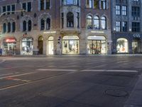 the street is empty but not as many traffic is in motion as the cars drive