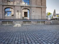 Berlin Cityscape with Classic Architecture and Cobblestone Road