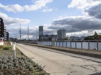 Berlin Cityscape: A Walkway Along the River