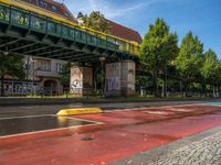 Moody Cityscape of Berlin: Wet Asphalt and Classic Architecture