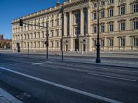 two lanes that appear to be in the middle of the road, and are straight lines to the left