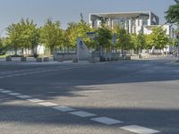 A Day in Berlin: Tree, Sunlight, and Road Surface