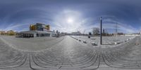 there is a wide picture of the city in this 360 - angle picture of the circular