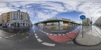 view of the city from above a 360 - angle shot of a rainy street in europe