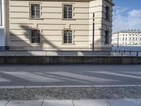 this is an image of the cityscape in europe from a distance, with a man riding his skateboard