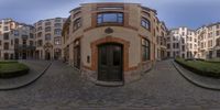 there is a 360 - panoramic image of a building at the corner of a street