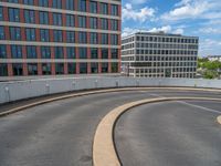 a car is driving on the highway through an underground parking garage area in a city