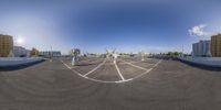 an empty parking lot is shown in this large fish eye lens image from a fisheye lens