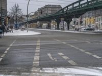 Berlin, Germany: City View with Snow Covered Bridge