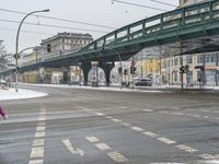 Berlin, Germany: City View with Snow Covered Bridge