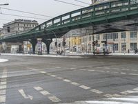 Berlin, Germany: City View with Snow Covered Bridge