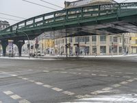 Berlin, Germany: City View with Snow Covered Bridge