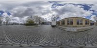 a wide angle view of the road and sky with cloud background from the street level