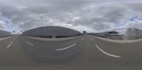 a blurry image of a highway and airport as seen from inside a moving camera lens