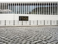 Berlin, Germany: Modern Architecture and Cobblestone Streets at Dawn