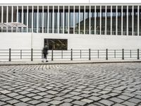 Berlin, Germany: Modern Architecture and Cobblestone Streets at Dawn